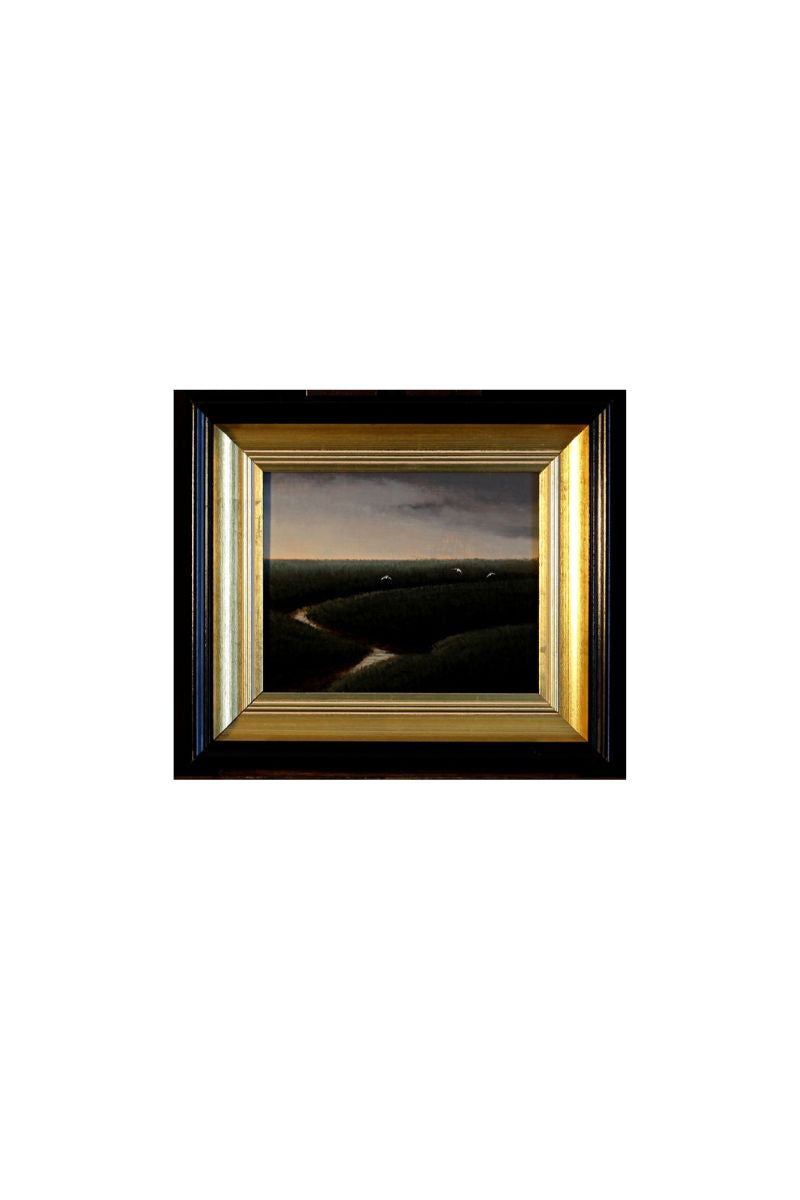 Framed artwork with a black and gold border on a white background